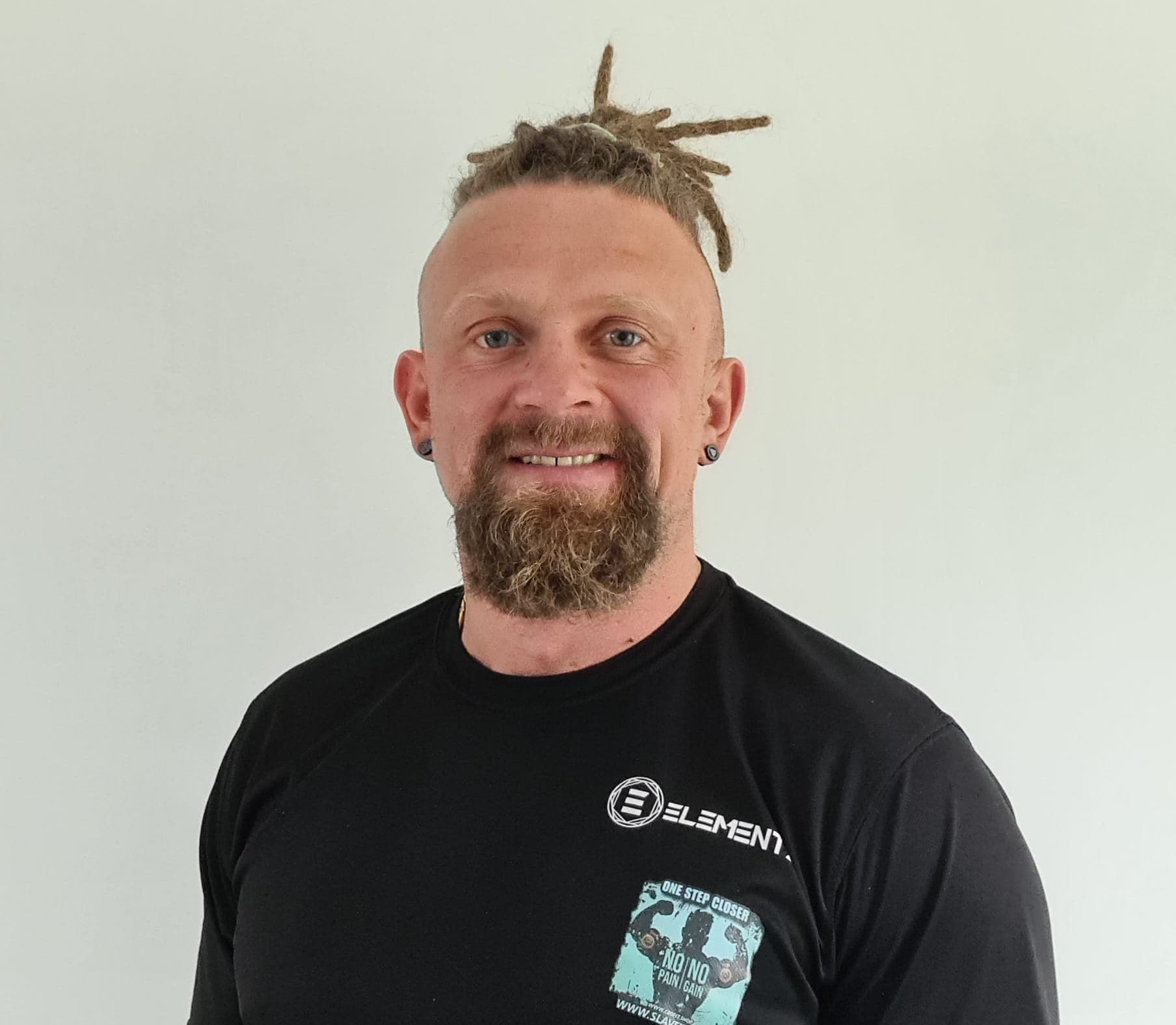 Slav, with a beard and a black cap